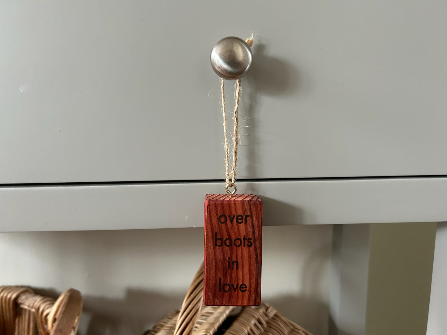 Wooden Hanging Decoration: Redwood. 'over boots in love...'