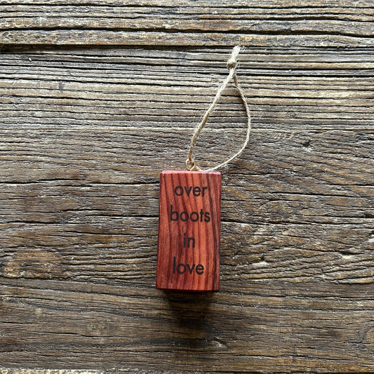 Wooden Hanging Decoration: Redwood. 'over boots in love...'